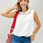 Sleeveless Knit Top With A Floral Embroidered Neckline and Gathered Bubble Hem
