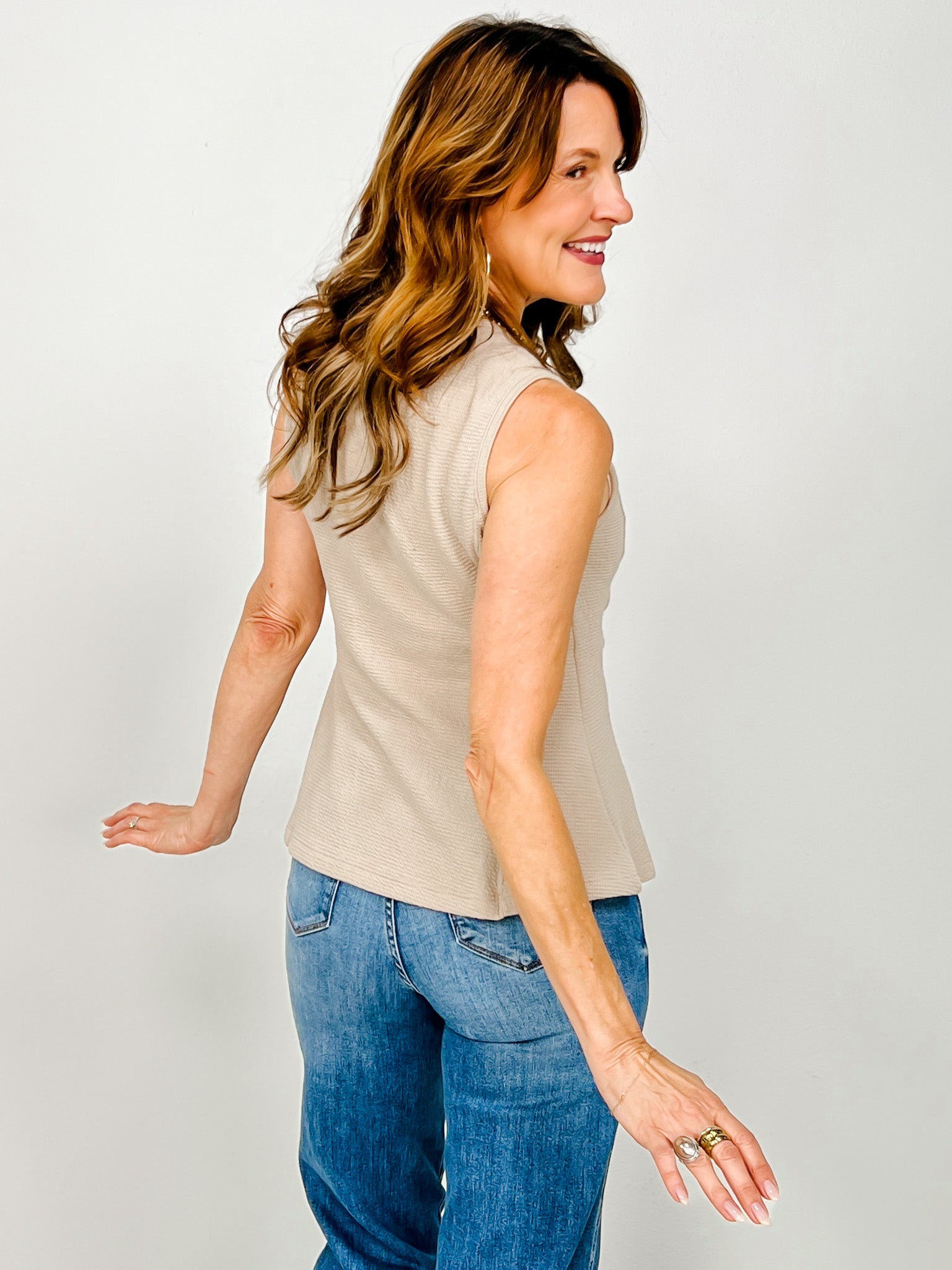 Sleeveless Round Neck Peplum Cloudy Knit Top