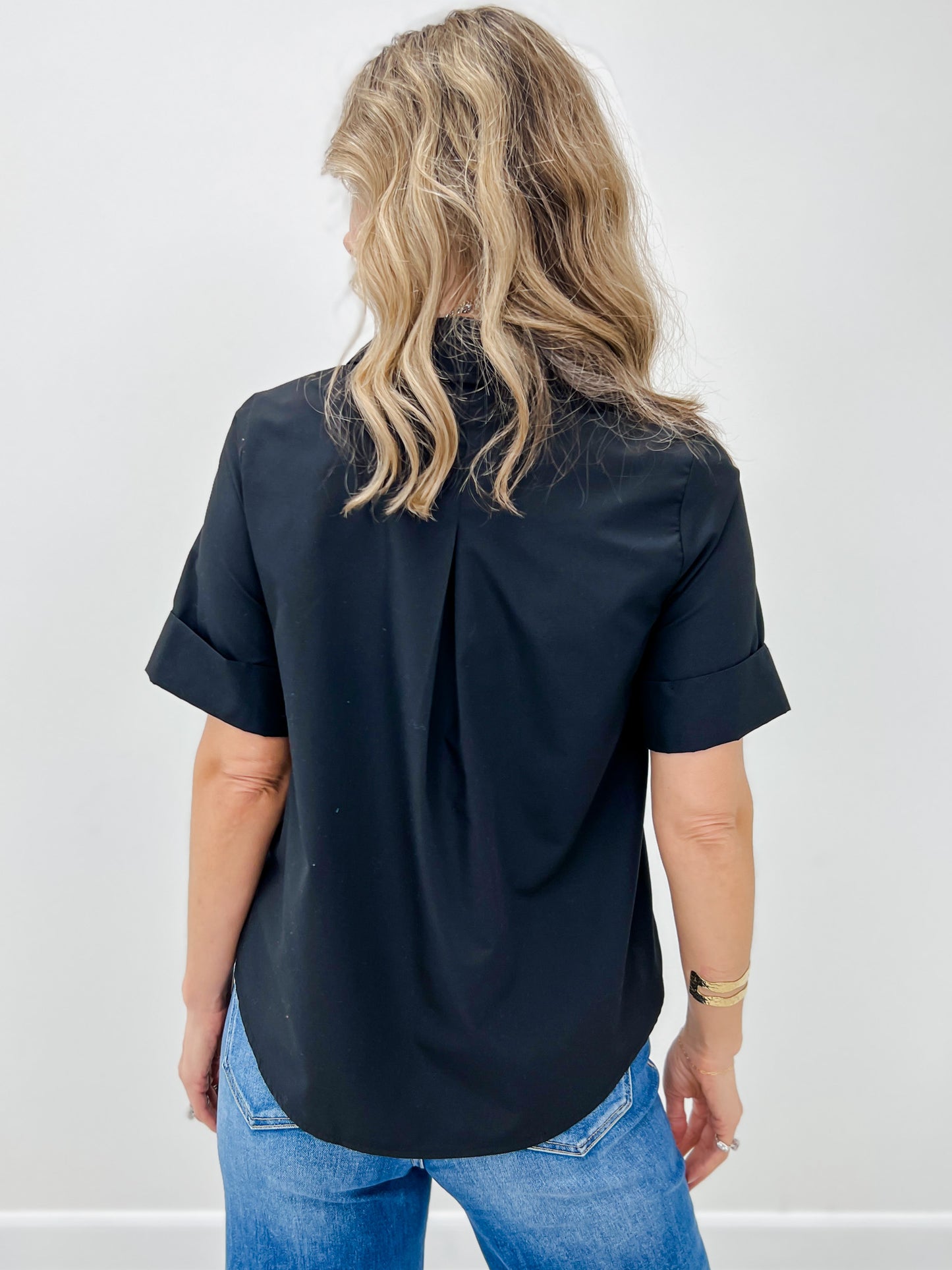 Short Sleeve Top With A Front Gold Decorative Button Placket And Collared Neck