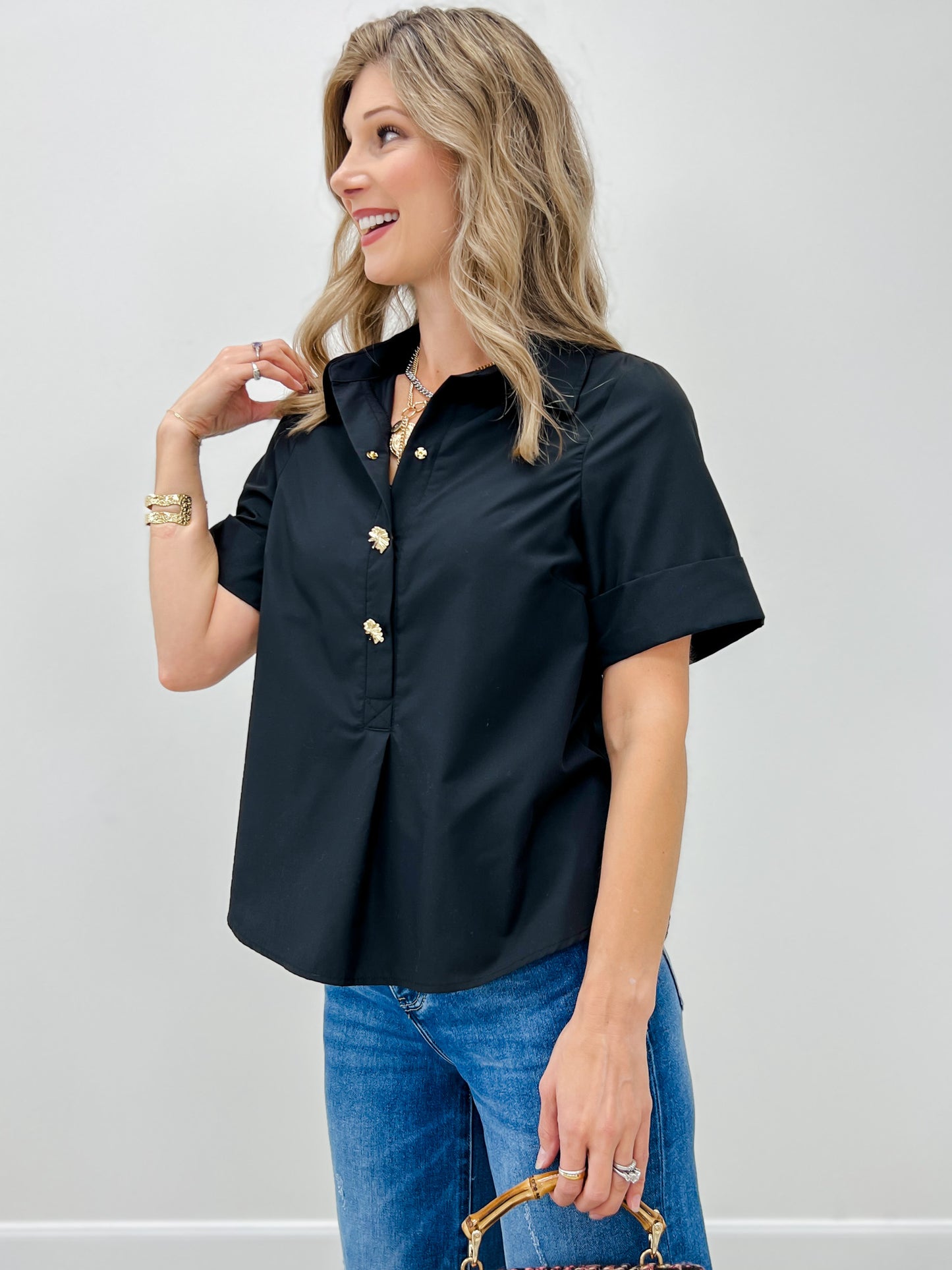 Short Sleeve Top With A Front Gold Decorative Button Placket And Collared Neck