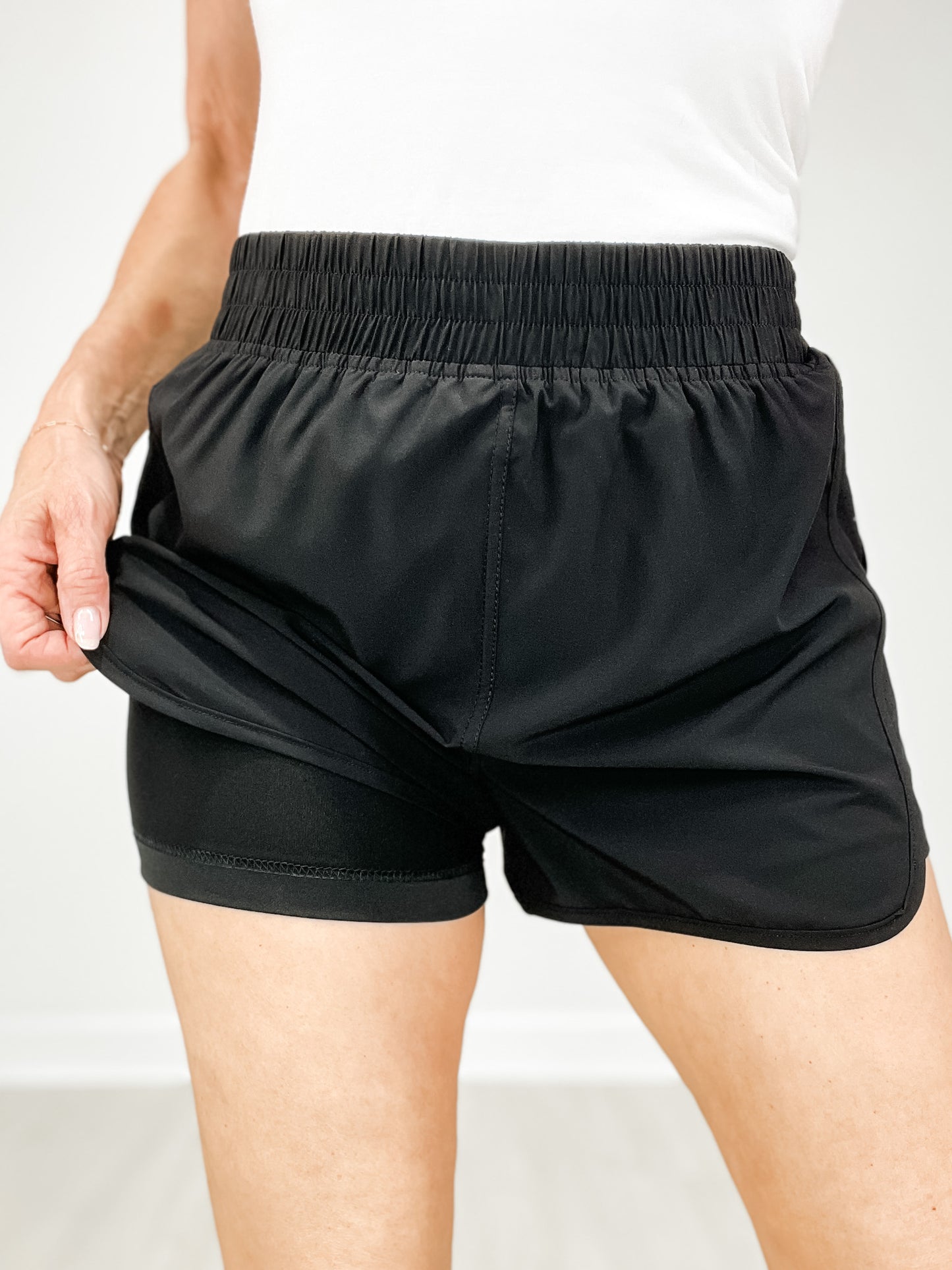 Elastic Waist Dolphin Shorts with Zipper Back Pocket