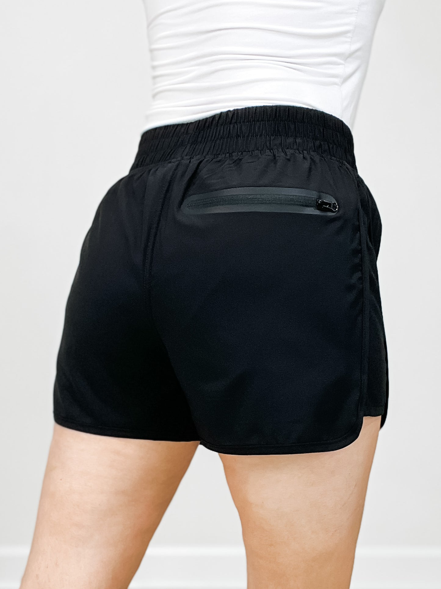 Elastic Waist Dolphin Shorts with Zipper Back Pocket