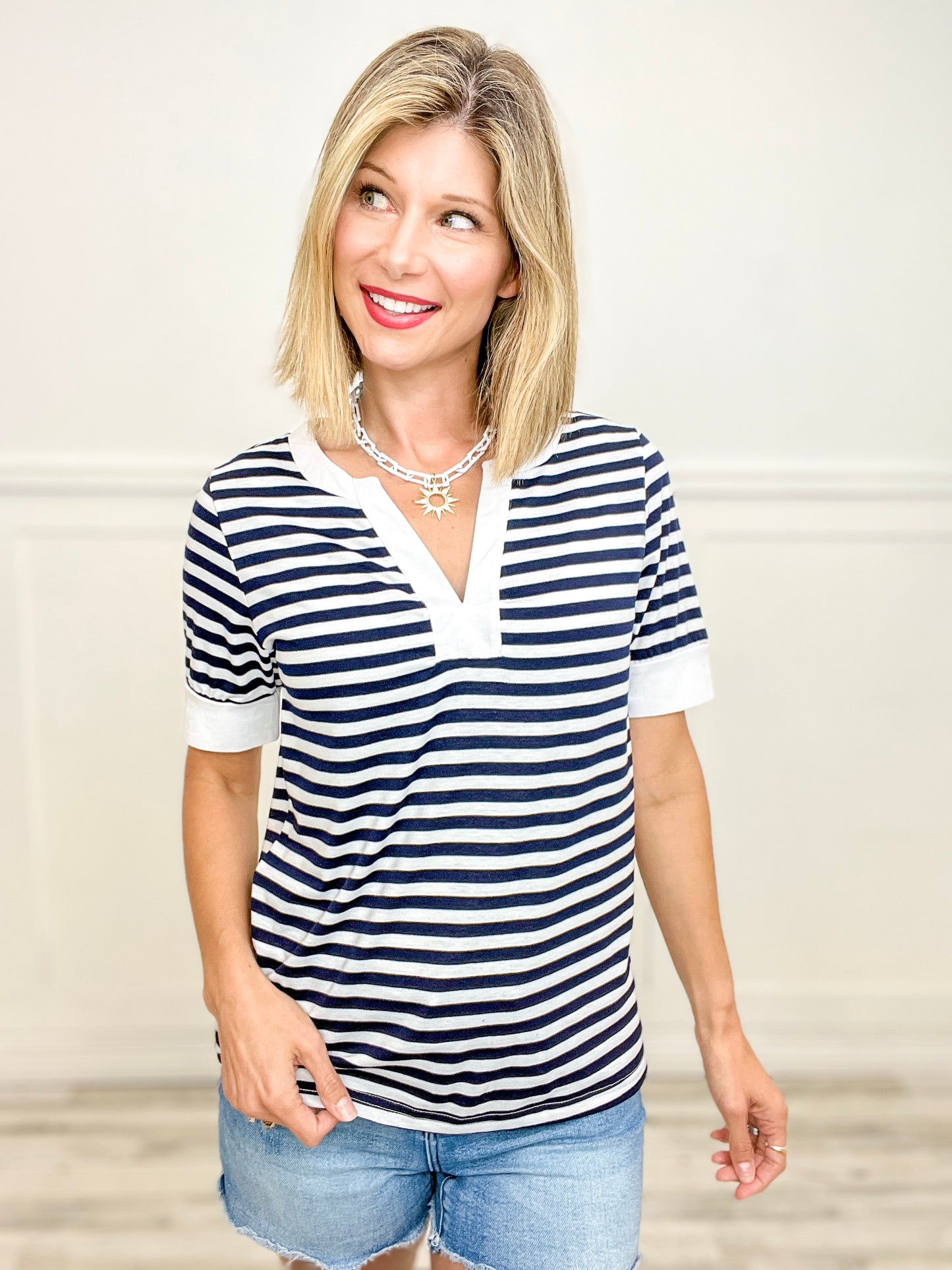 STRIPED NOTCHED V-NECK KNIT TOP