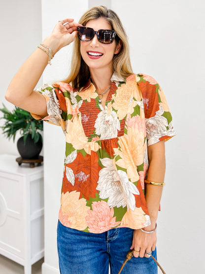 Floral Short Puff Sheeve Top Featuring a Smocked V Neck