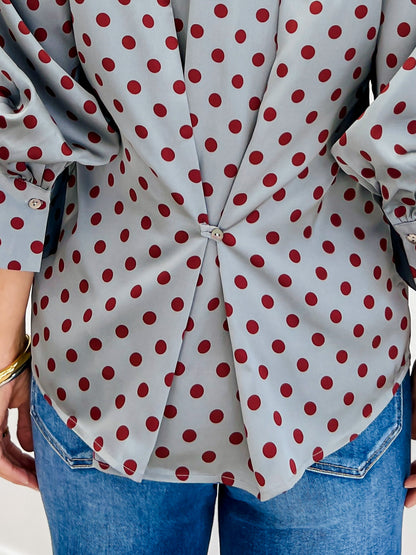 Polka Dot Long Sleeve Top Featuring A Button Closure