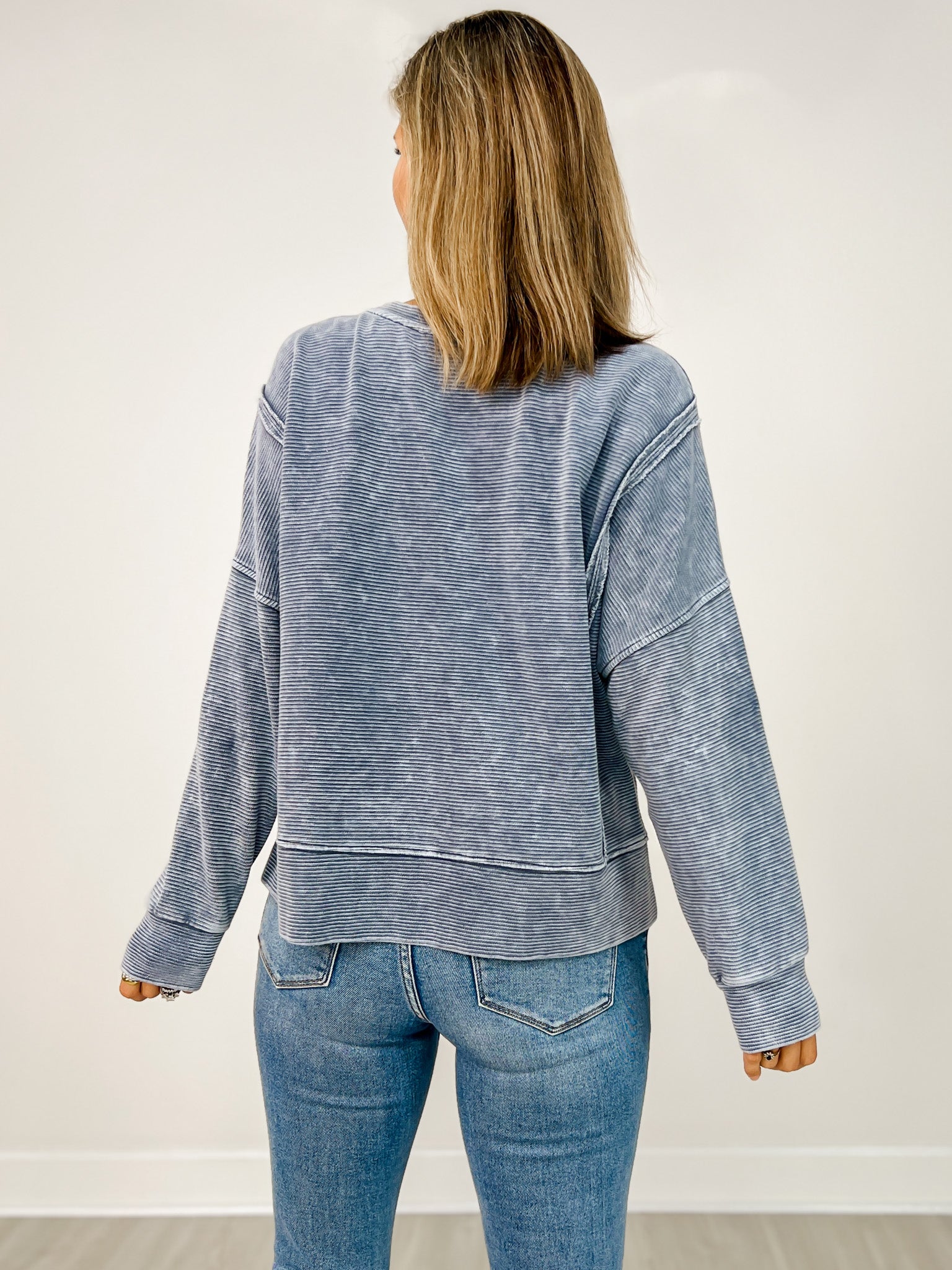 Washed Exposed Seam Side Slit Long Sleeve Knit Top