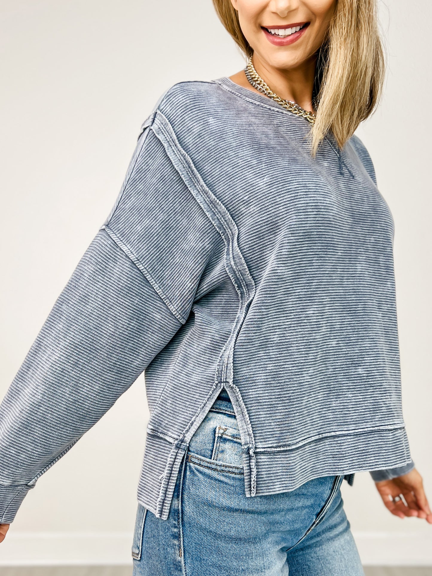 Washed Exposed Seam Side Slit Long Sleeve Knit Top