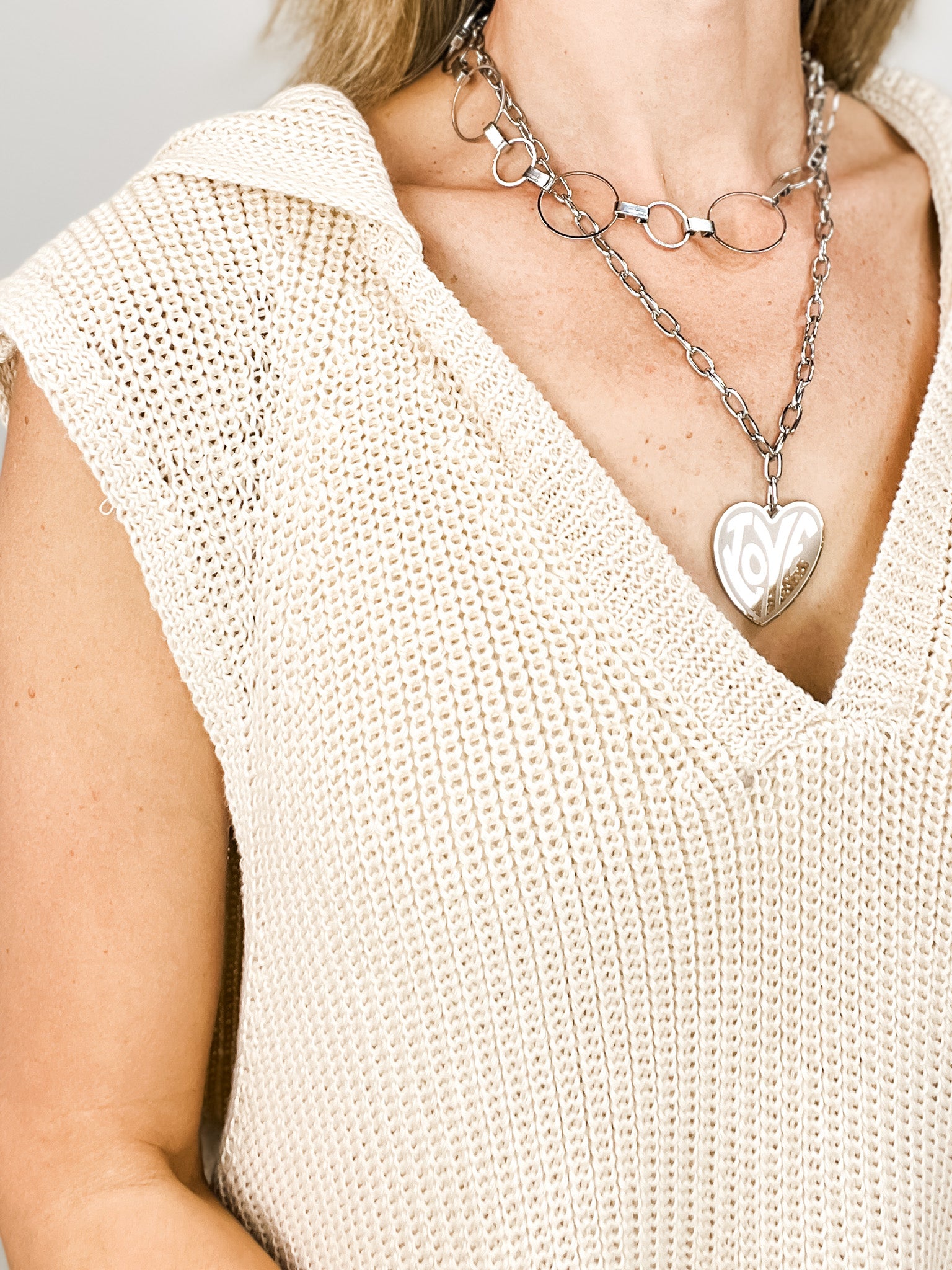 Sleeveless Solid Knit Hoodie Top with Side Slits and V-Neckline