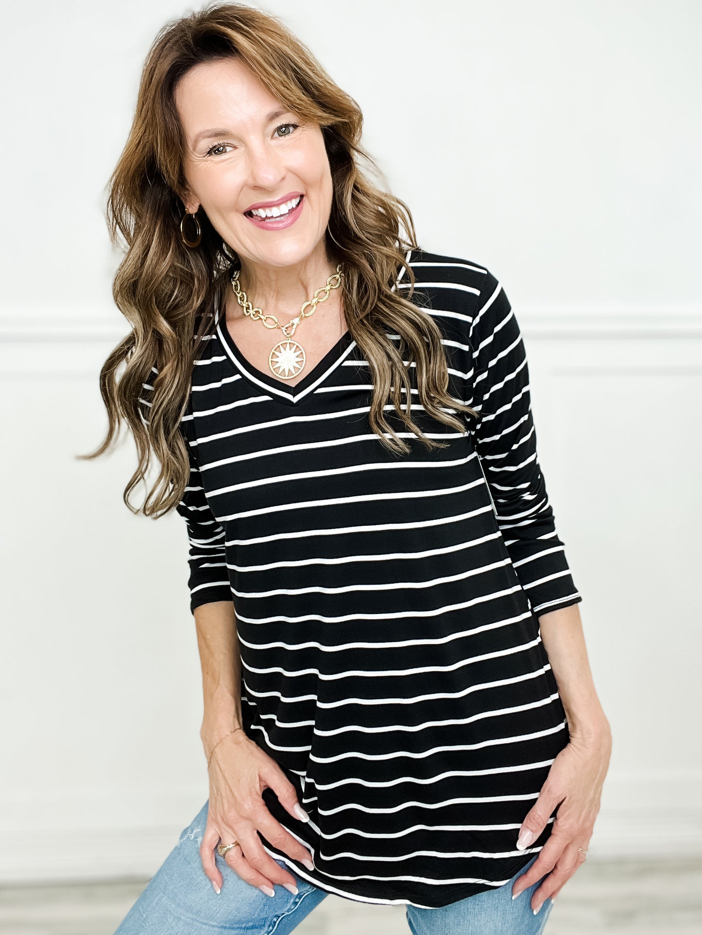 Long Sleeve Striped Top with V-Neckline and Rounded Hem