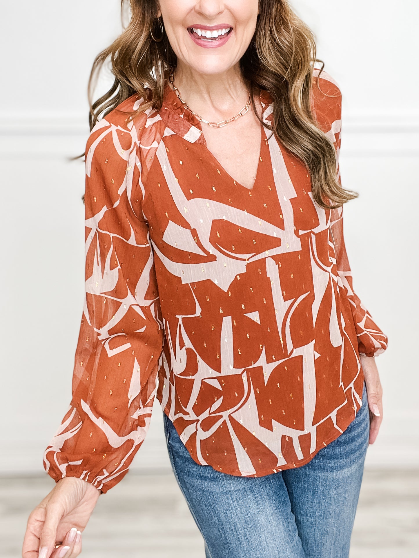 LONG SLEEVE V-NECK RUFFLE DETAIL ABSTRACT TOP