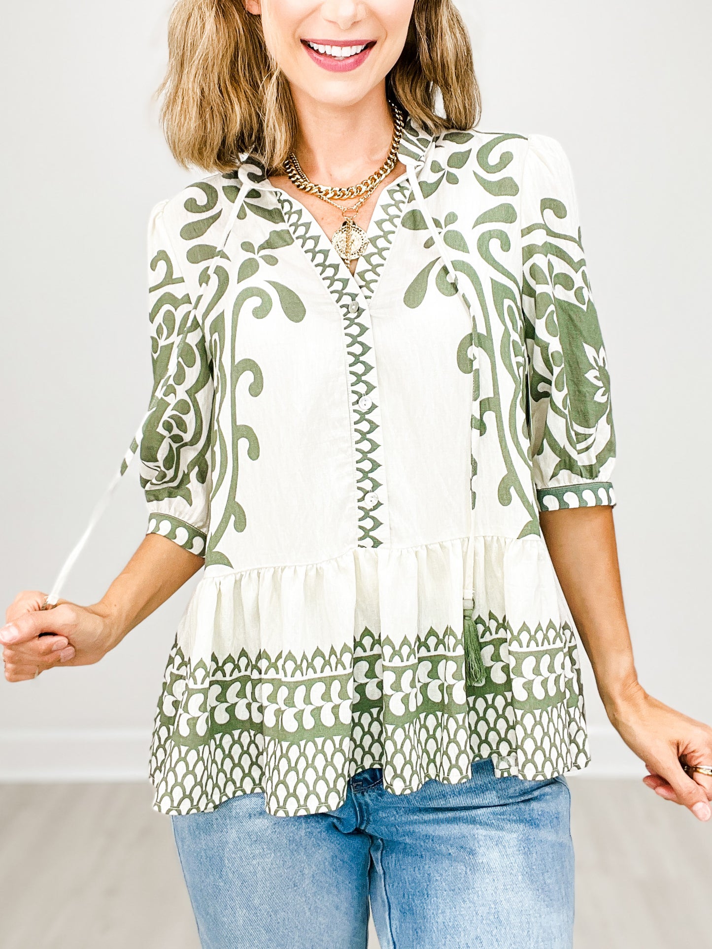 Abstract Border Print Top with Tassel Tie Neckline
