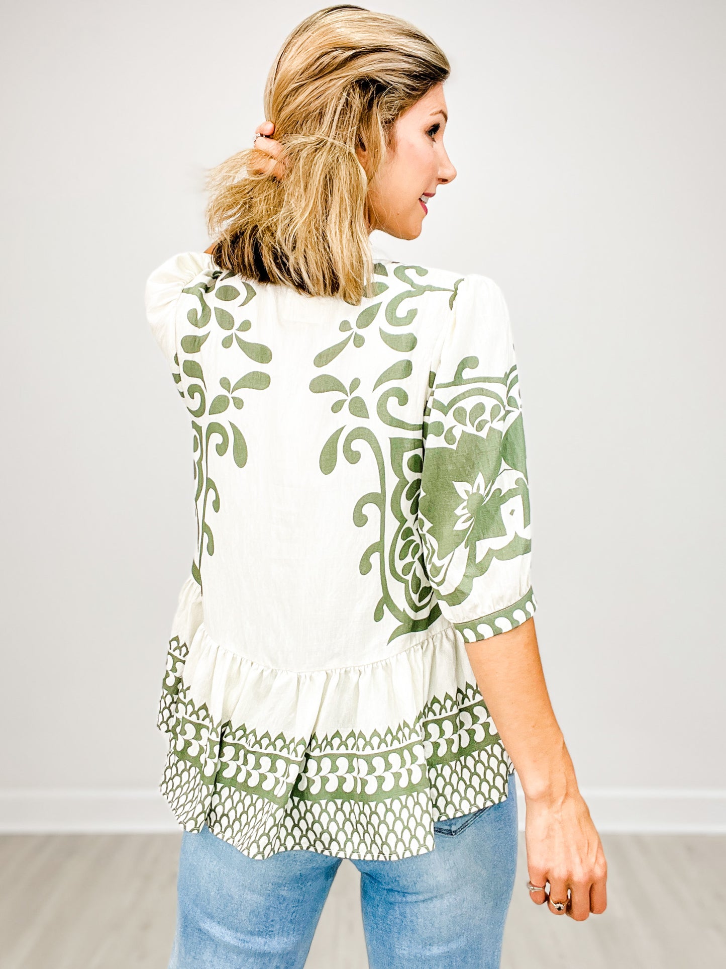 Abstract Border Print Top with Tassel Tie Neckline