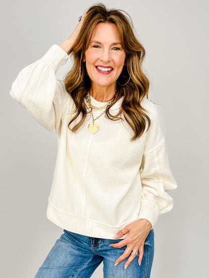 Raw Edge Detail Oversized Textured Knit Top