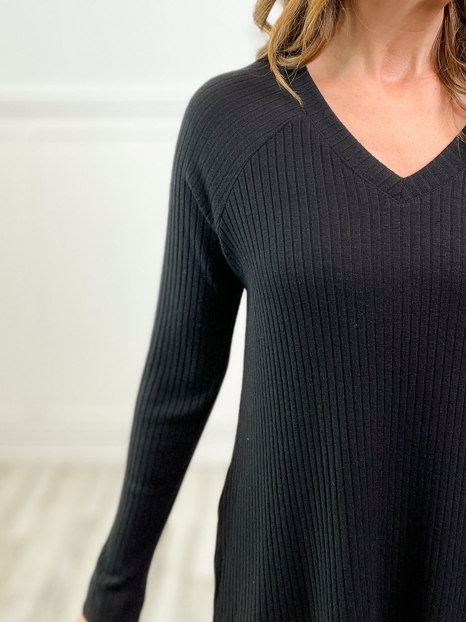 Perfectly Cozy Ribbed V-Neck Side Slit Long Sleeve Top in Black – Emma  Lou's Boutique