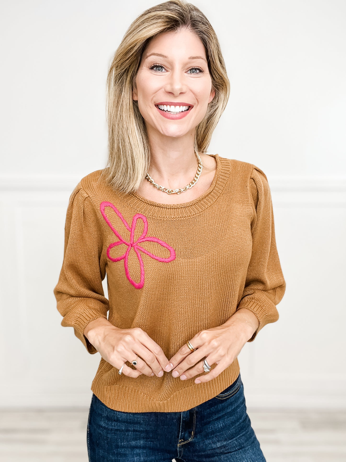 Three Quarter Sleeve Solid Knit Top with Embroidered Floral Accent