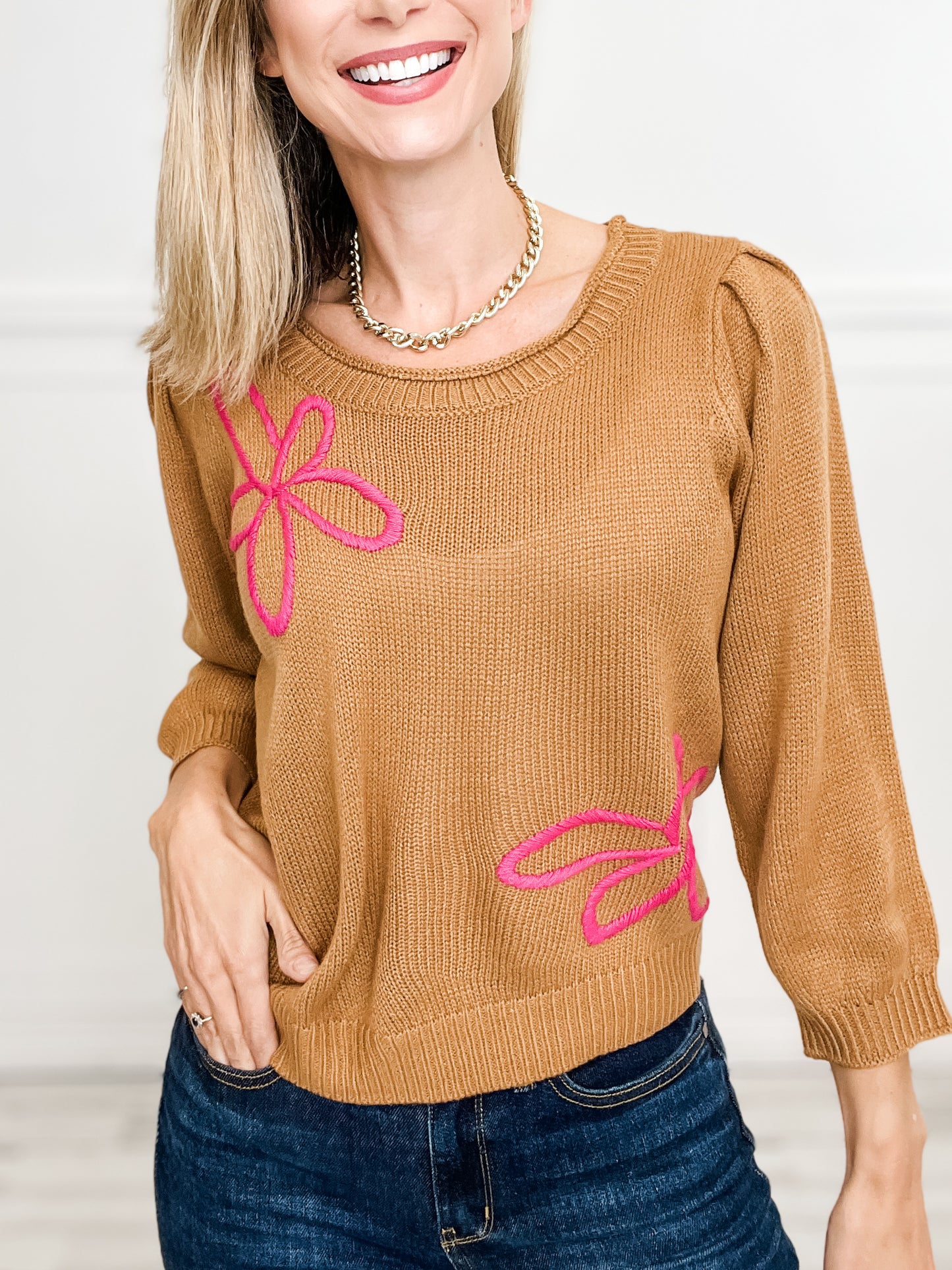 Three Quarter Sleeve Solid Knit Top with Embroidered Floral Accent