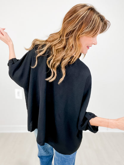 V-Neck Half Sleeve Top with Button Detail Sleeves