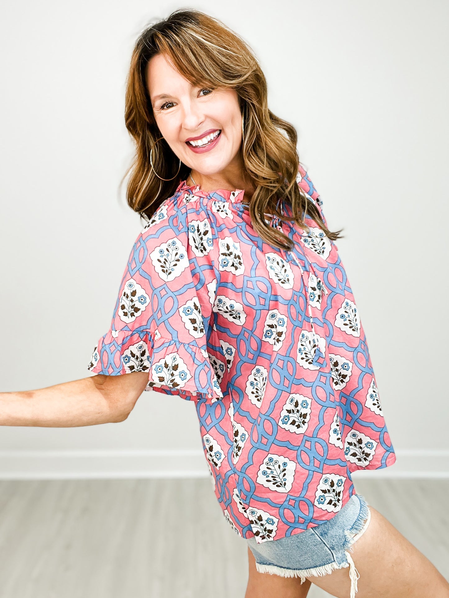 Patterned Top with Bell Sleeves and Tie Neckline