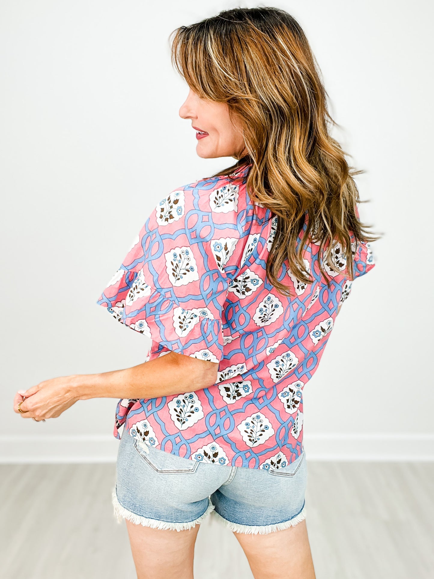 Patterned Top with Bell Sleeves and Tie Neckline