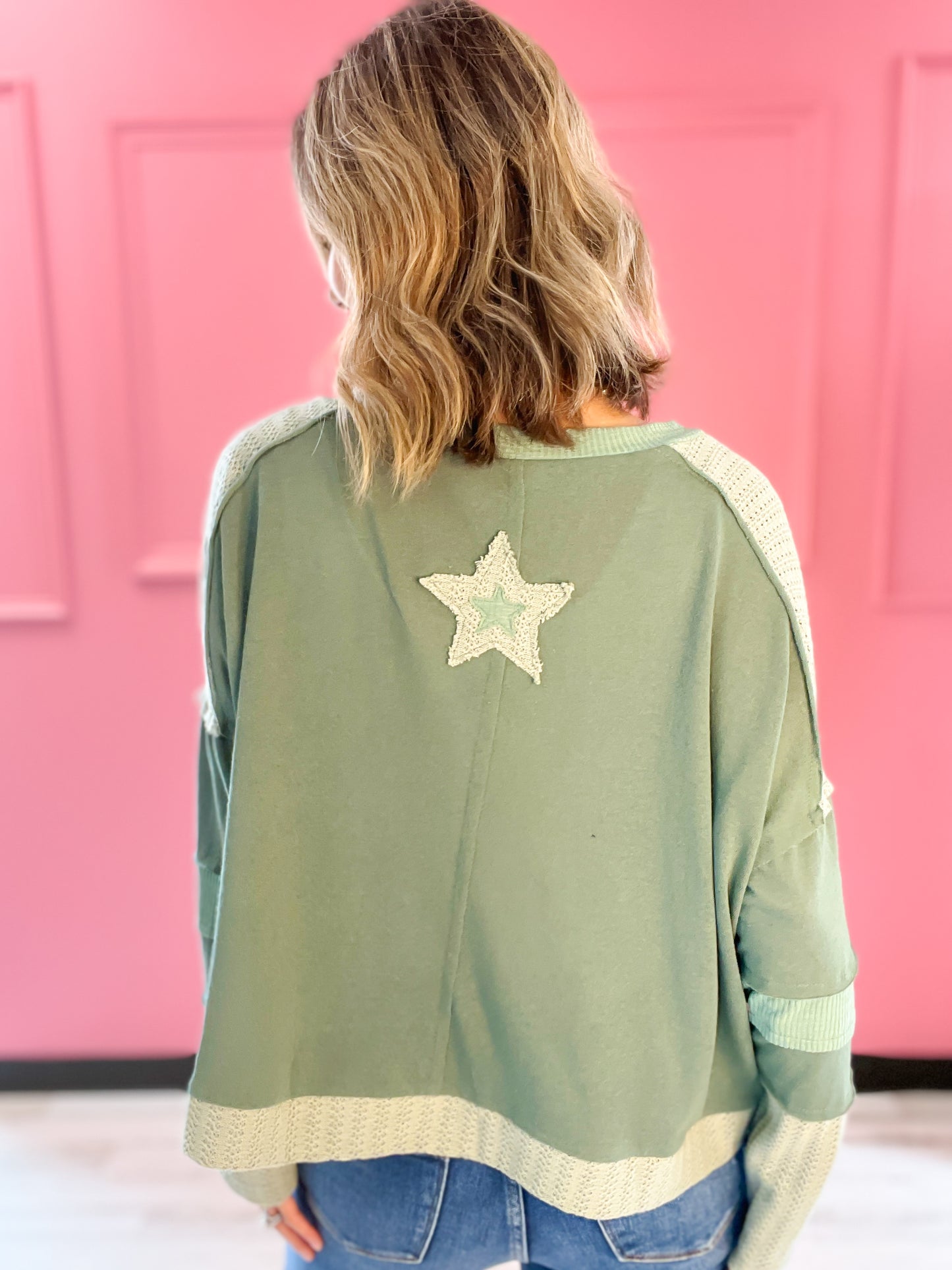 A Star Is Born Star Patch Long Sleeve Cropped Knit Top - A