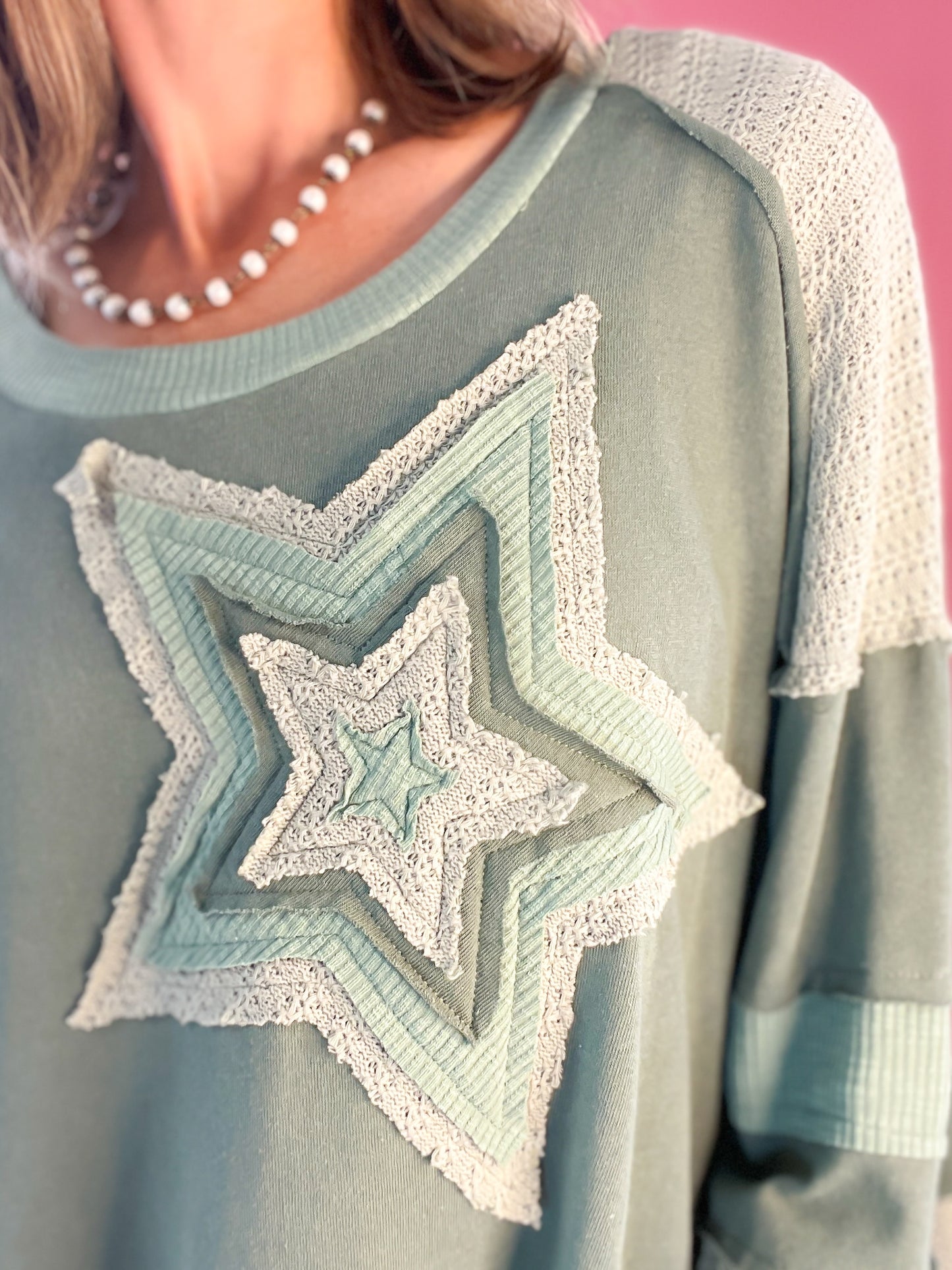 A Star Is Born Star Patch Long Sleeve Cropped Knit Top - A