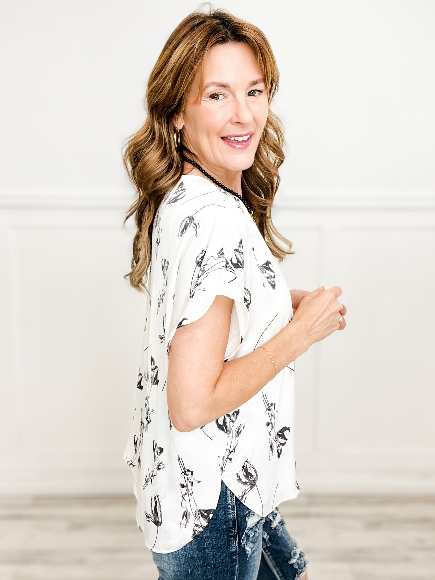 Short Sleeve Dolman Sleeve Top with Subtle Floral Print