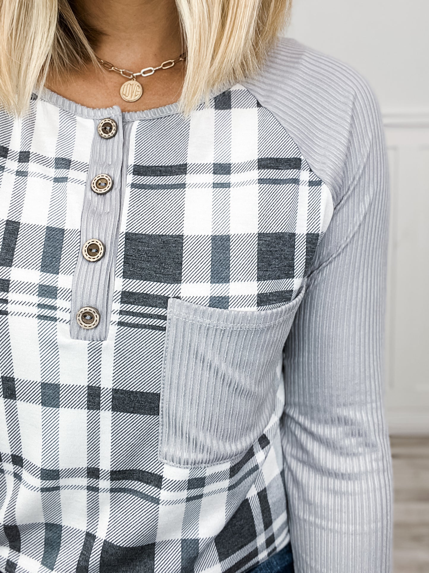 CHECKER JERSEY KNIT HENLEY TOP WITH FRONT POCKET