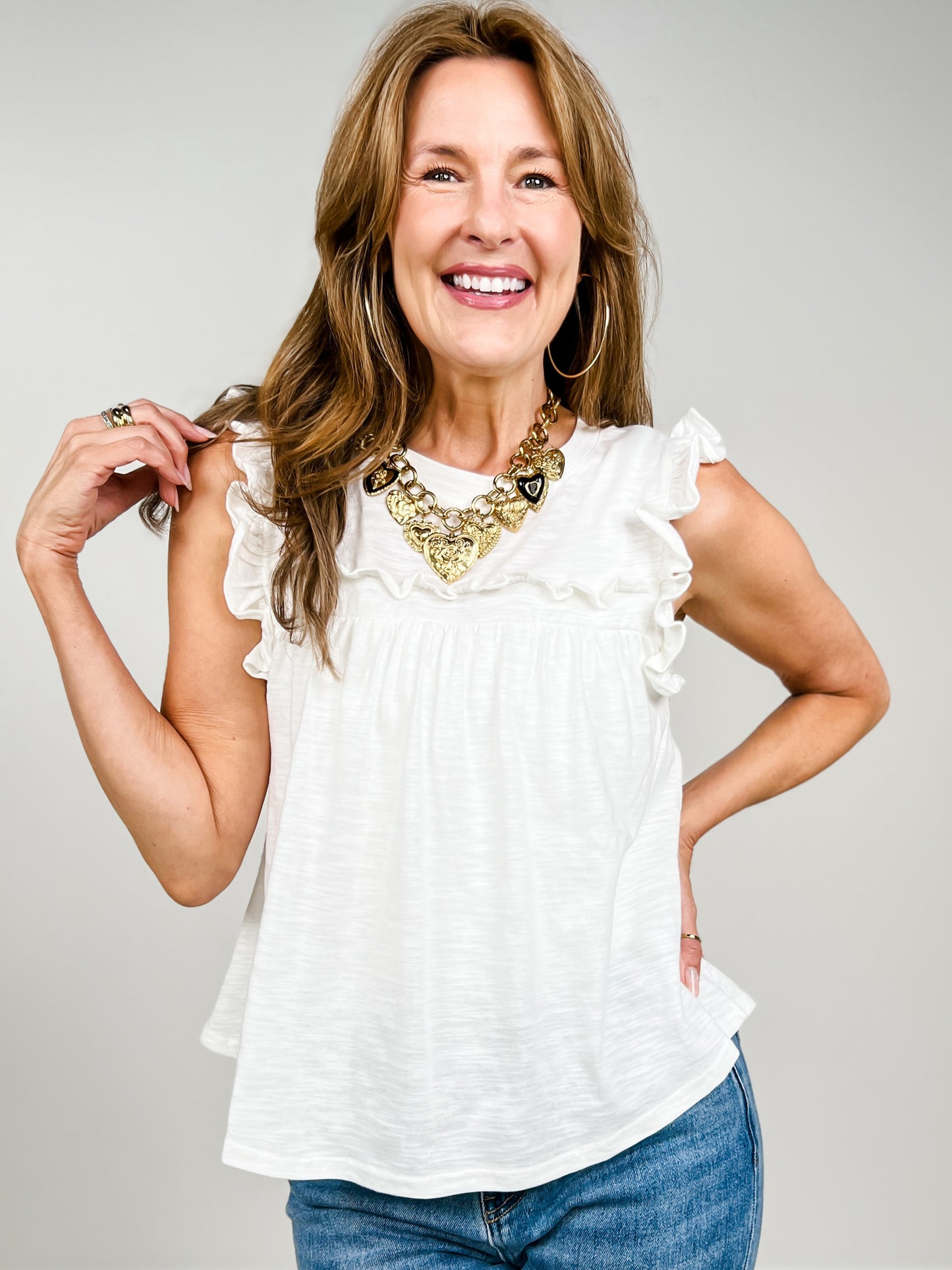 Sleeveless Ruffle Detail Solid Knit Top - GRP B