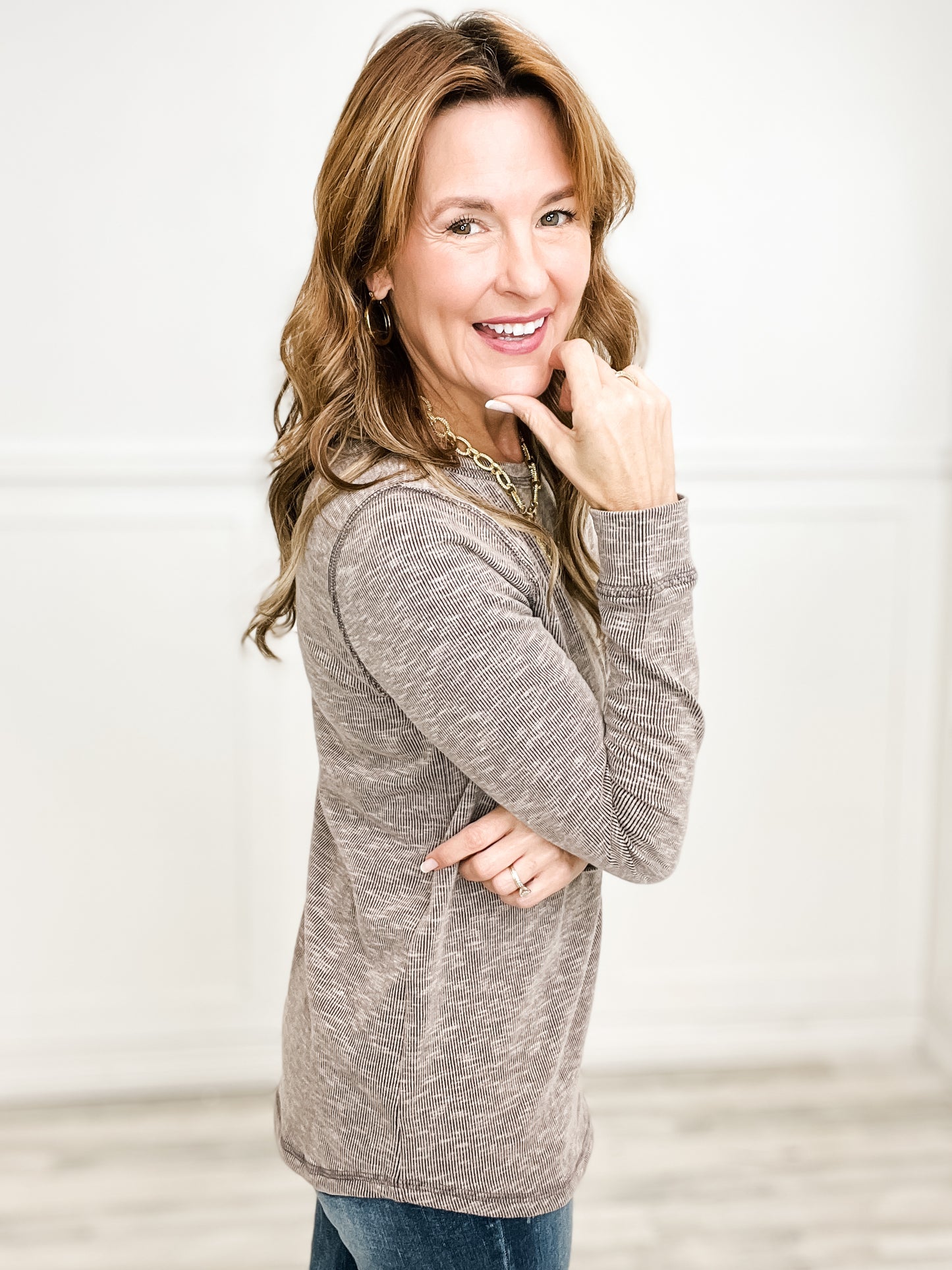 Long Sleeve Exposed Stitch Top with Front Pocket