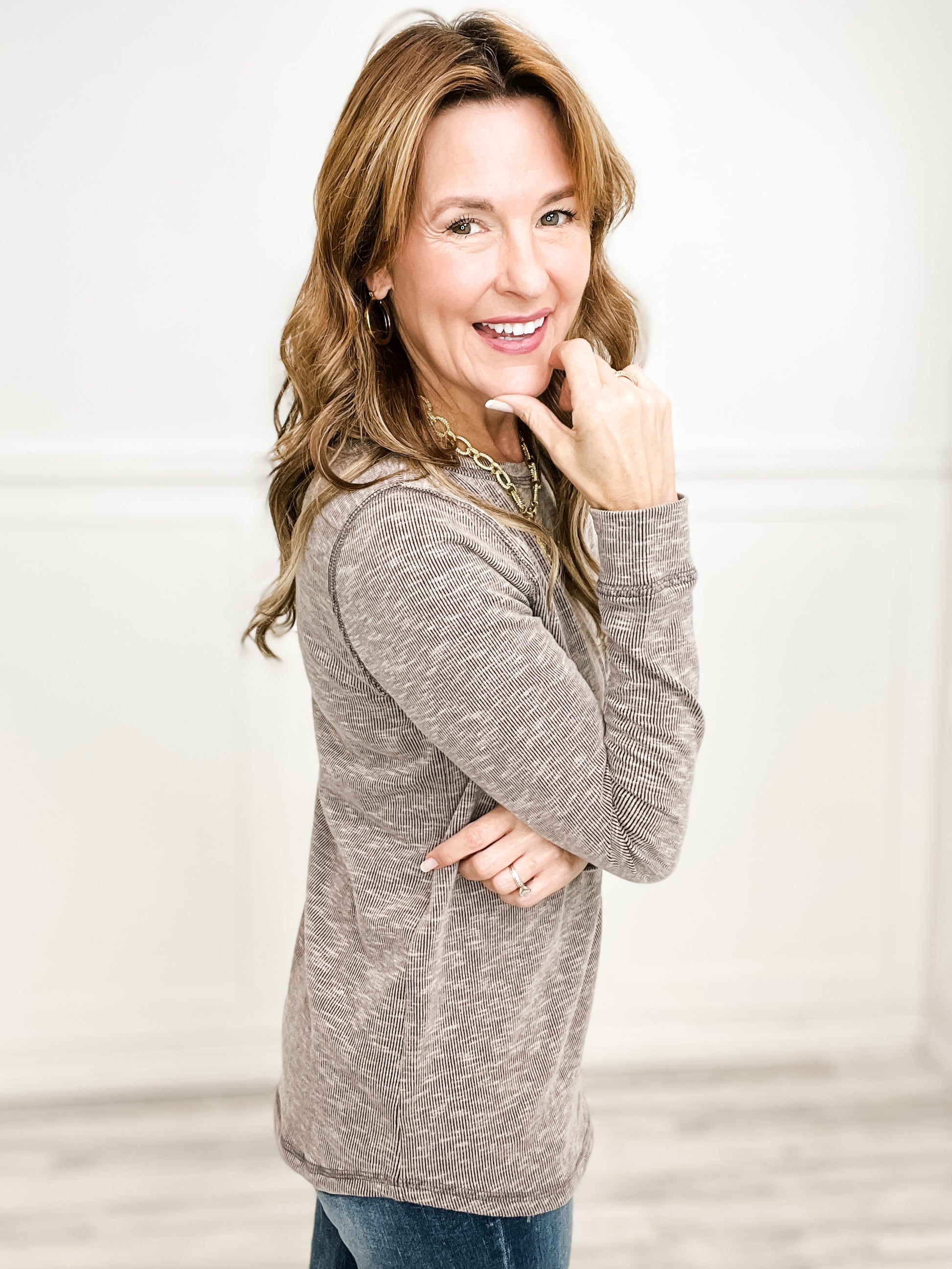 Long Sleeve Exposed Stitch Top with Front Pocket
