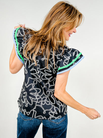 Abstract Print Flutter Sleeve Top with V-Neckline