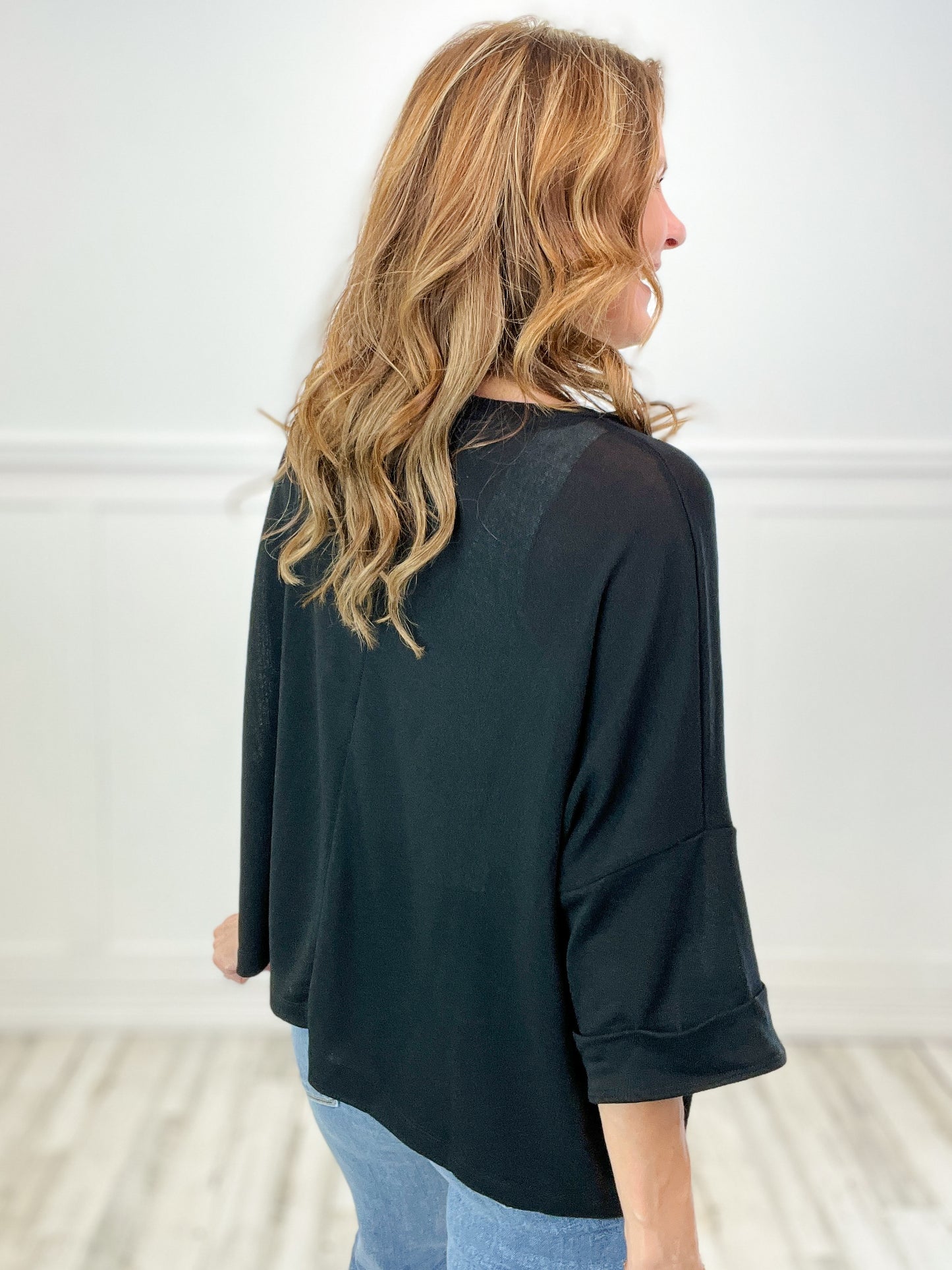 Three-Quarter Sleeve Solid Knit Top