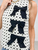 Bow Textured Woven Sleeveless Top With Bow Appliques
