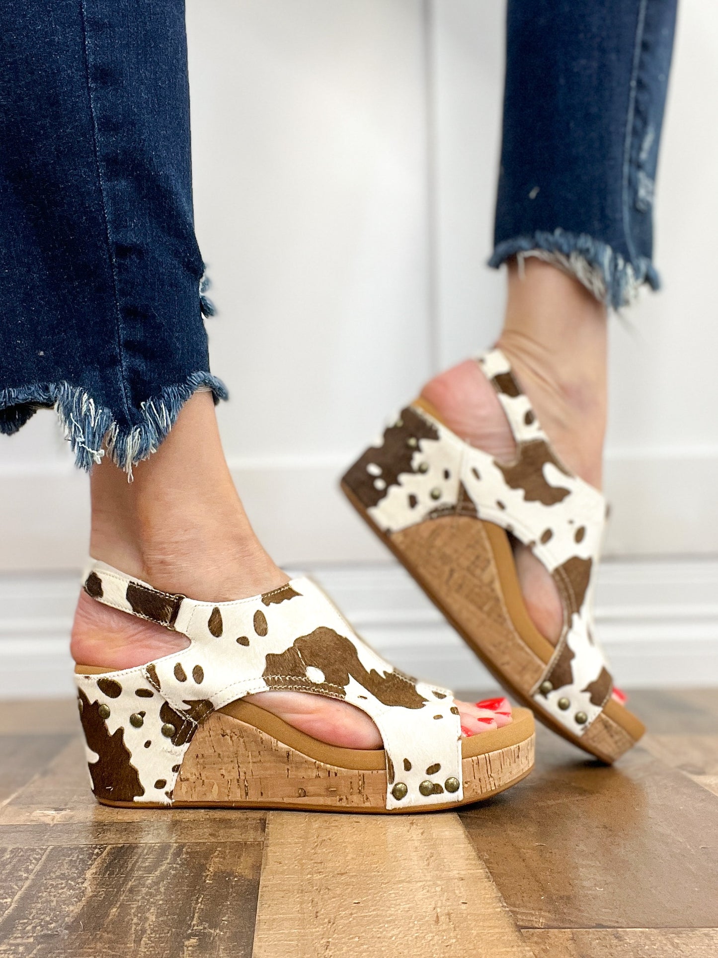 Corkys Pasture Wedge Sandals in Cow Print